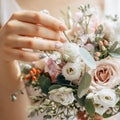 Bride holding wedding bouquet with white and pink flowers Royalty Free Stock Photo