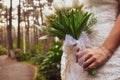 Bride holding white elegant modern autumn wedding bouquet. Royalty Free Stock Photo