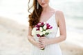 Bride holding white rose flower wedding bouquet Royalty Free Stock Photo