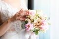 The bride holds a beautiful wedding bouquet Royalty Free Stock Photo