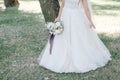 Bride holds a wedding bouquet, wedding dress, wedding details Royalty Free Stock Photo