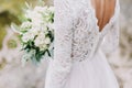 Bride holds a wedding bouquet, wedding dress, wedding details Royalty Free Stock Photo