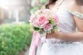 Bride holds a wedding bouquet, wedding dress, wedding ring,wedding details. Royalty Free Stock Photo