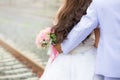 Bride holds a wedding bouquet, wedding dress, wedding ring,wedding details. Royalty Free Stock Photo