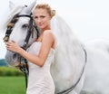 Bride, horse and field with portrait, event and animal for marriage, celebration and happiness. Woman, uk countryside Royalty Free Stock Photo