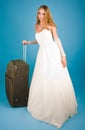 Bride with large suitcase Royalty Free Stock Photo