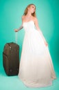 Bride with large suitcase Royalty Free Stock Photo