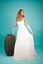Bride with large suitcase Royalty Free Stock Photo