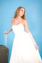 Bride with large suitcase Royalty Free Stock Photo