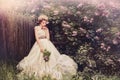 Bride with lilac flowers in retro style