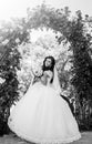 Bride with long brunette hair with flower. Royalty Free Stock Photo