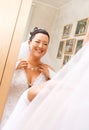Bride looking at her reflection