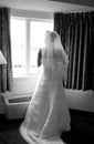 Bride looking out of window