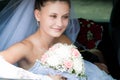 Bride looks out of the car Royalty Free Stock Photo