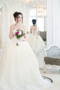 Bride in luxury interior in palace. Wedding, attractive brunette Royalty Free Stock Photo