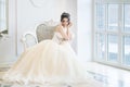 Bride in luxury interior in palace. Wedding, attractive brunette Royalty Free Stock Photo