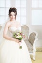 Bride in luxury interior in palace. Wedding, attractive brunette Royalty Free Stock Photo