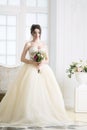 Bride in luxury interior in palace. Wedding, attractive brunette Royalty Free Stock Photo