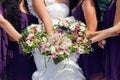 Bride and maids of honor with bouquetes