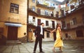 Bride makes a groom to go with her holding his hand