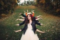 Bride with many hands in a forest Royalty Free Stock Photo