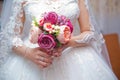 The bride holds a bouquet of white roses in her hands - Image. Bouquet in the hands of the bride - Image Royalty Free Stock Photo