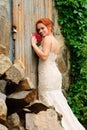 Bride near the old locked door Royalty Free Stock Photo