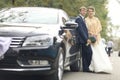 Bride near wedding car