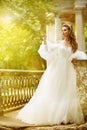 Bride Outdoor Portrait, Beautiful Wedding Fashion Model in Elegant White Dress Royalty Free Stock Photo