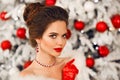 Bride portrait of Elegant woman with ruby jewelry set and red gloves. Beautiful brunette lady with wedding hairstyle, beauty Royalty Free Stock Photo