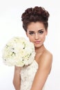 Bride with prom hairdo and fancy bouckuet Royalty Free Stock Photo