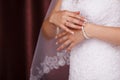 Bride puts on pearl bracelet. Royalty Free Stock Photo