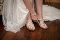 Bride putting on shoes Royalty Free Stock Photo