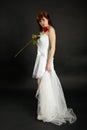 Bride with rose and veil on black background Royalty Free Stock Photo