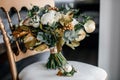 The bride's bouquet is on a chair Royalty Free Stock Photo