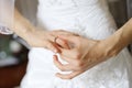 Bride's hands and a wedding or angagement ring Royalty Free Stock Photo