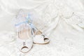 Bride's shoes, garter, wedding dress Royalty Free Stock Photo