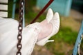 bride's shoes on a swing