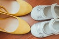 Bride shoes and shoes child Royalty Free Stock Photo