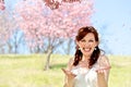 Bride Showered by Cherry Blossom Petals