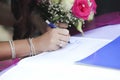 Bride signing wedding marriage register Royalty Free Stock Photo