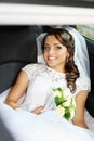 Bride sitting in the car Royalty Free Stock Photo