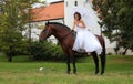 Bride sitting on a horse