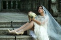 Bride sitting on stairs Royalty Free Stock Photo