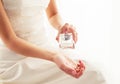 Bride spraying perfume Royalty Free Stock Photo