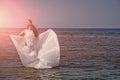 Bride on sunny summer day on blue water Royalty Free Stock Photo