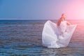 Bride on sunny summer day on blue water Royalty Free Stock Photo