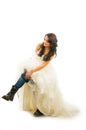 Bride taking off jeans Royalty Free Stock Photo