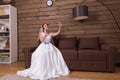 Bride talking by phone, looking at wedding ring Royalty Free Stock Photo