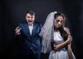 Bride with tearful face and terrible brutal groom